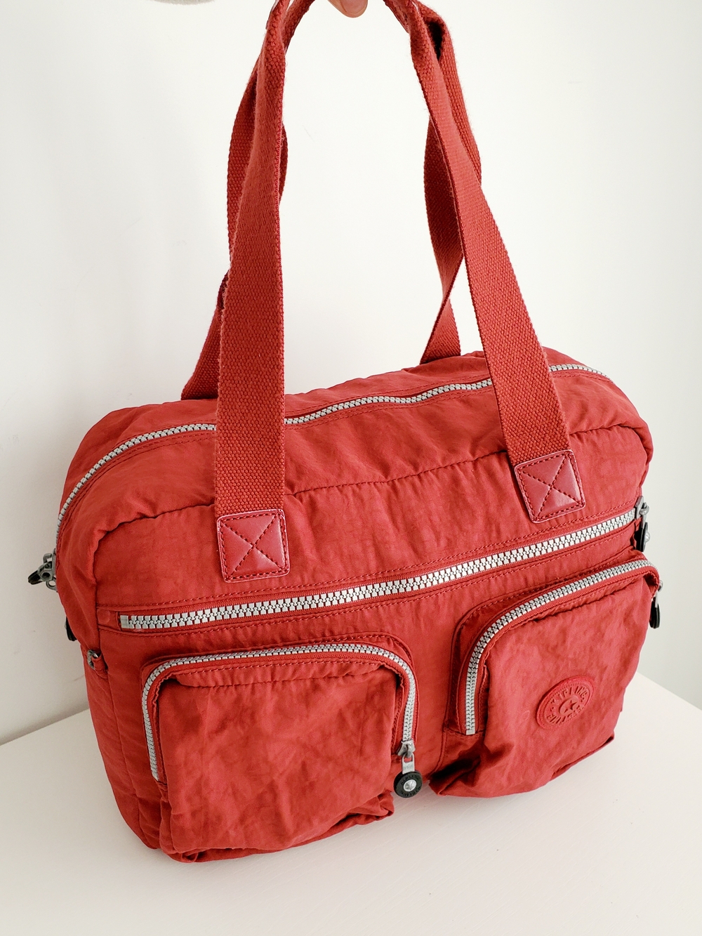 Kipling Red Travel Tote with Multiple Zip Pockets
